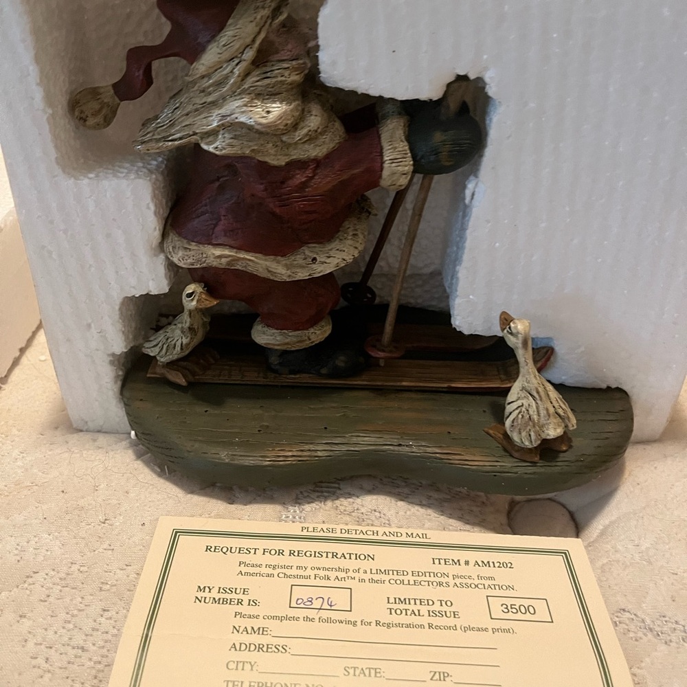Santa Claus Figurine with Ducks